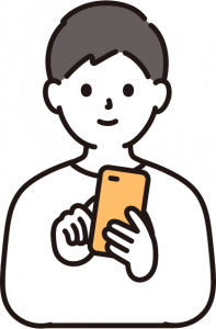 スマートフォンを操作する男性